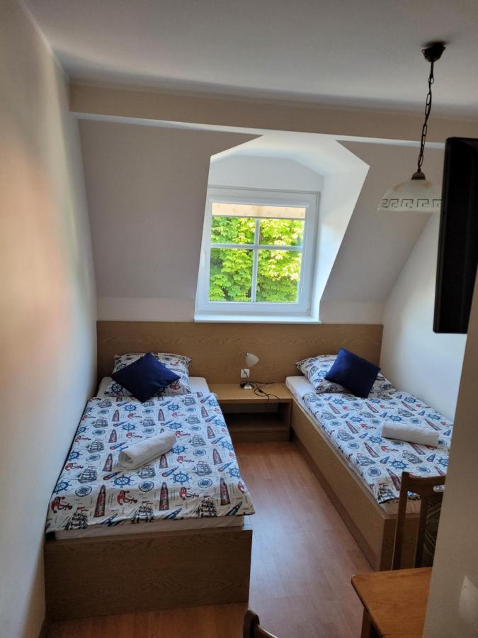 Dom Wczasowy Pod Zegarem Łeba Rom bilde